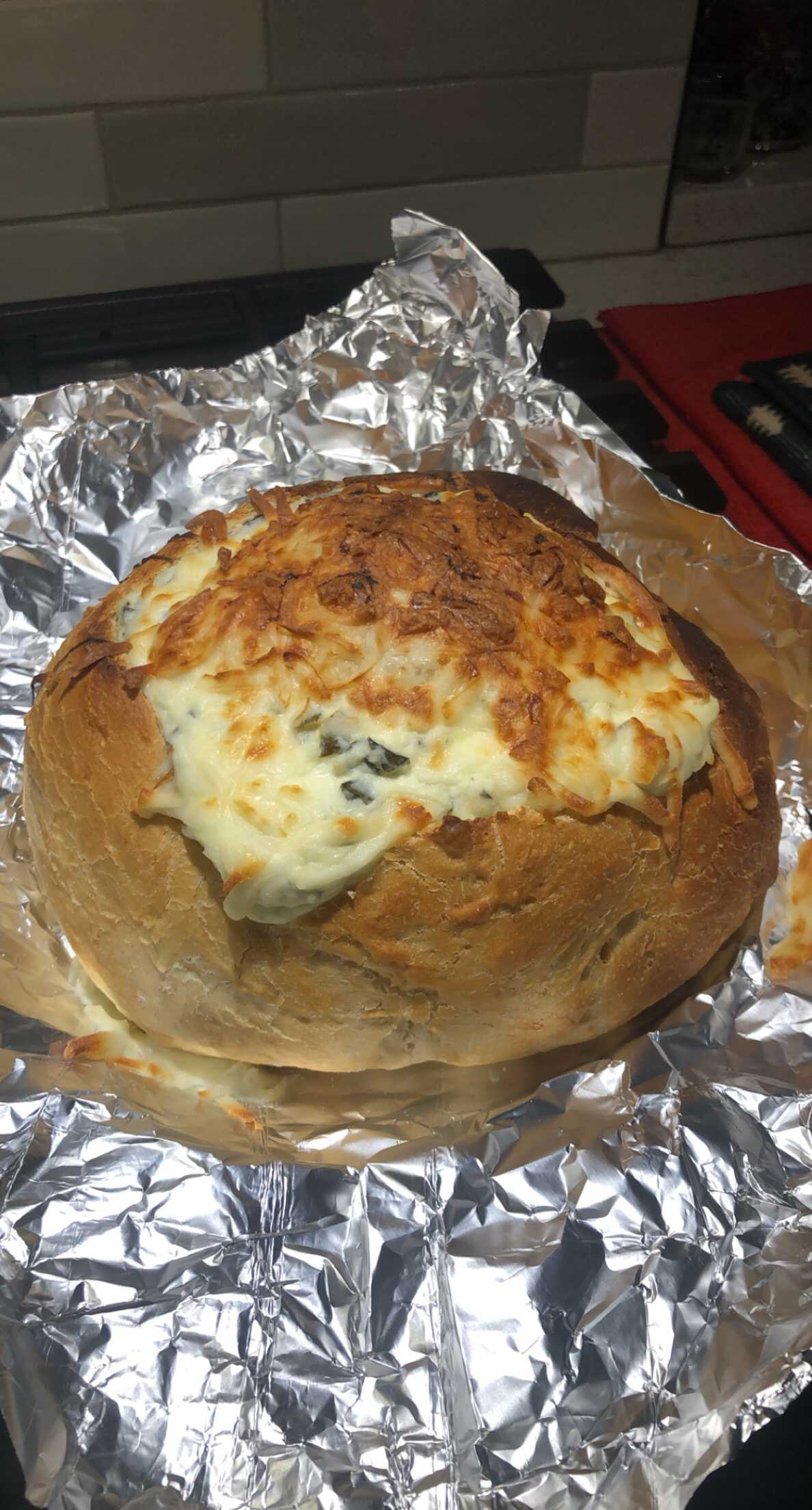 Superbowl Spinach Dip in a Sourdough Bowl Christies Bakery